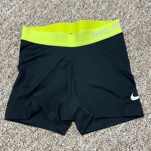 black with yellow band NIKE pros